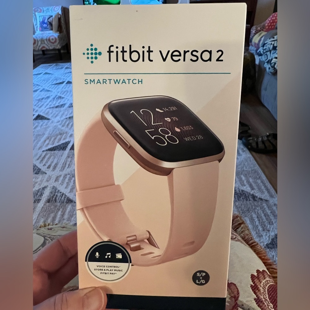 Fitbit Versa 2- Excellent used condition. Has small & large bands + xtra bands